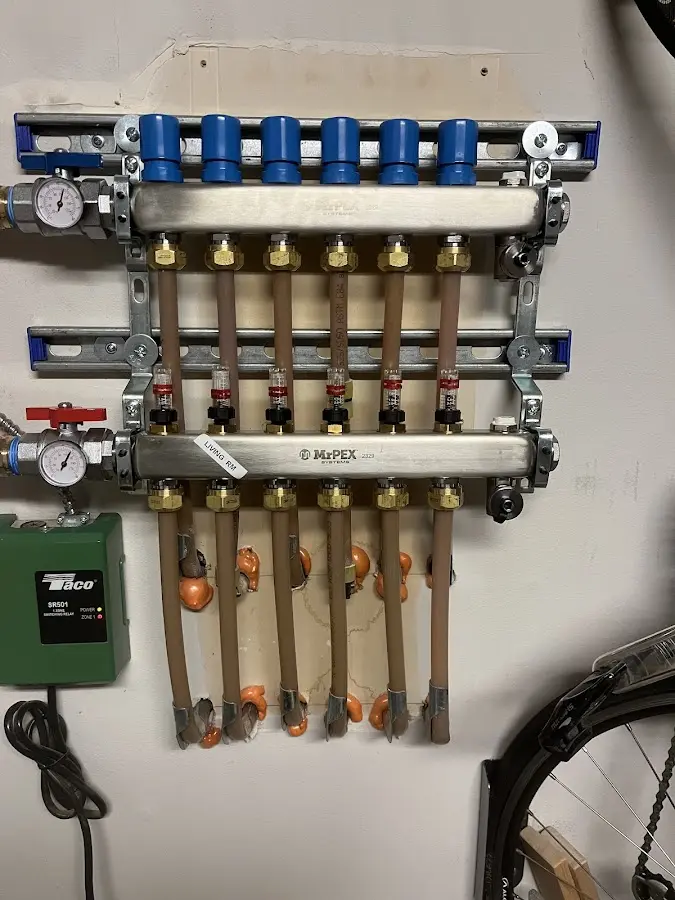 Plumber performing Water Heater Repair at a residential property in Circleville